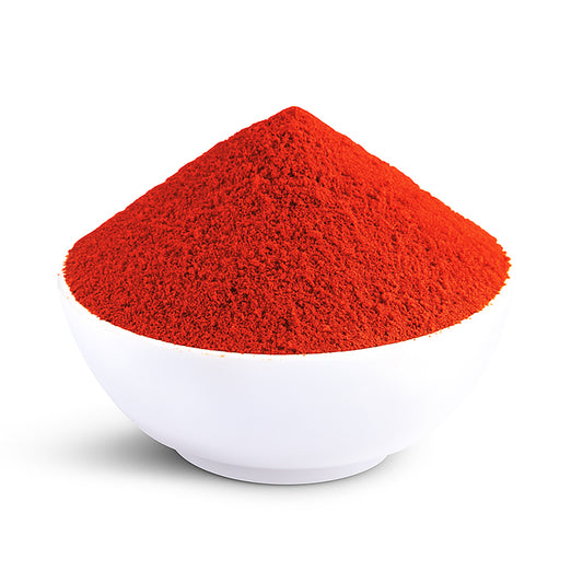 Kashmiri chilli powder in a white bowl, showing the bright red colour and fine natural texture of Mantra Herbs homemade spice